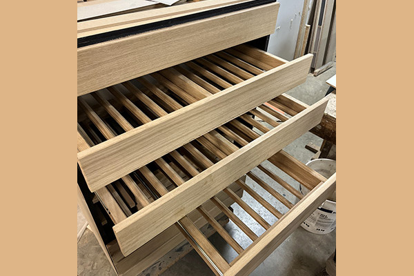 Menuiserie Taquet ile de France fabrication meuble bouteille
