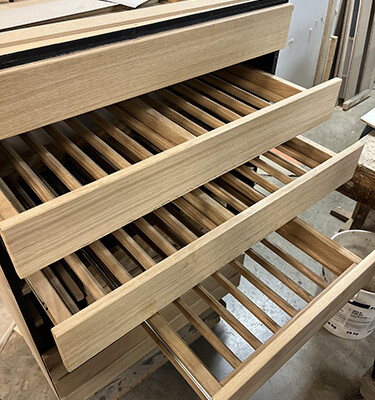 Menuiserie Taquet ile de France fabrication meuble bouteille